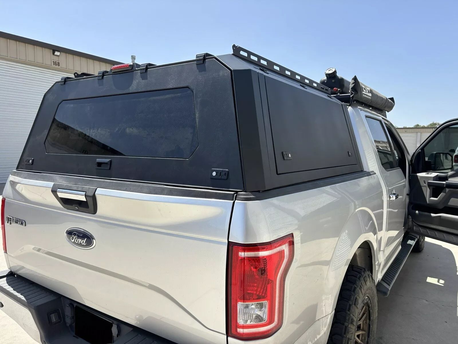 Ford F-150 camper shell, Ford F-150 camper shell for sale, Ford F-150 truck topper, F-150 pickup truck camper shell, Ford F-150 bed camper shell, F-150 fiberglass camper shell, Ford F-150 aluminum camper shell, F-150 cab-high truck topper, Ford F-150 commercial camper shell, F-150 overland camper shell, Ford F-150 hard camper shell, F-150 soft camper shell, Ford F-150 truck cap, F-150 replacement camper shell, Ford F-150 bed topper for multiple model years, F-150 camper shell with bed rack, Ford F-150 enclosed truck bed topper, F-150 camper shell for 5.5, 6.5 and 8-foot beds, Ford F-150 pickup bed topper, F-150 camper shell and truck topper accessories,