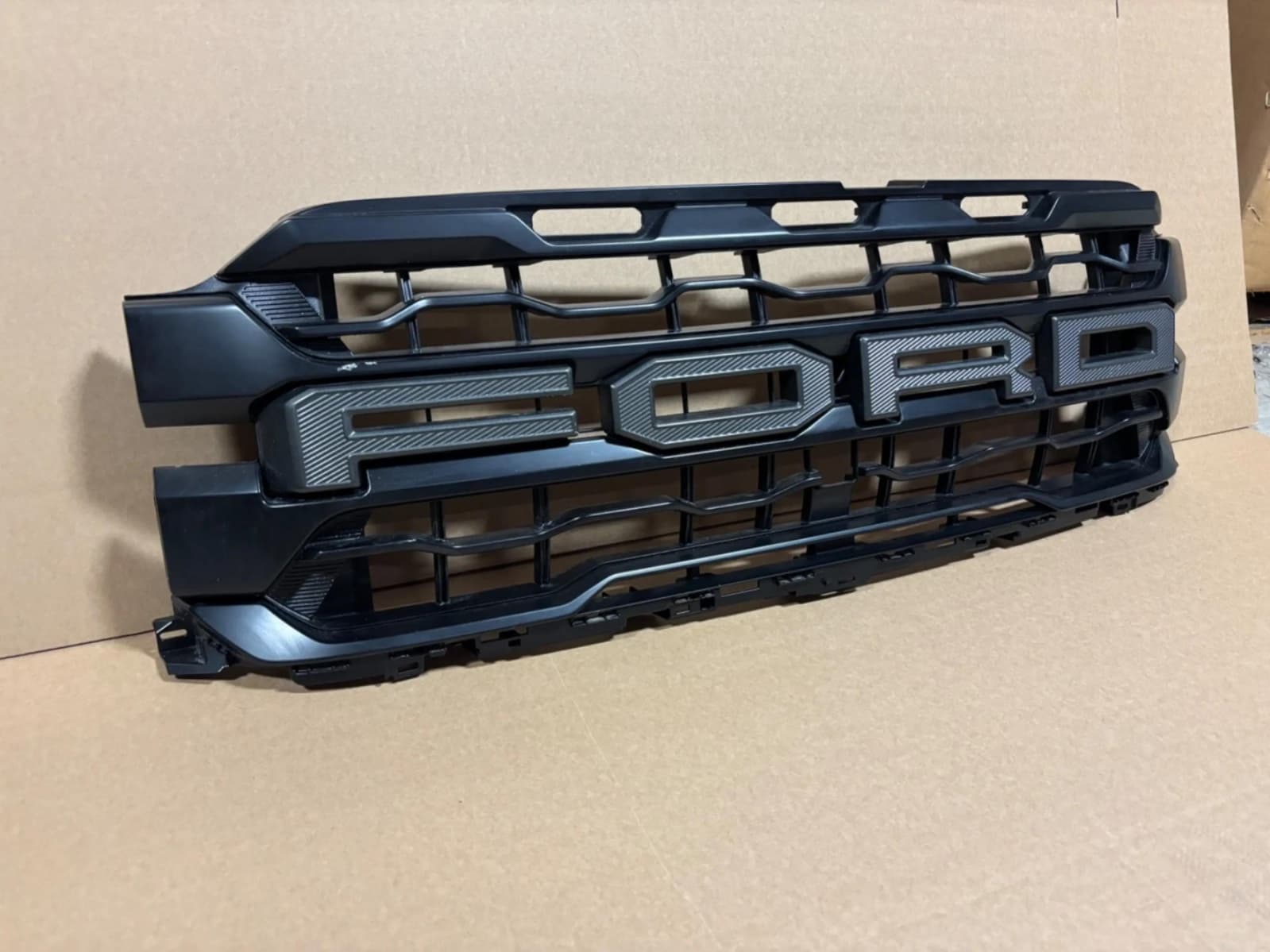 Ford F-150 grille replacement for front-end styling, Ford F-150 OEM-style grille replacement, Ford F-150 black mesh grille, Ford F-150 chrome grille replacement, Ford F-150 Raptor-style grille, Ford F-150 LED grille with custom styling, Ford F-150 off-road grille replacement, Ford F-150 aftermarket front grille, Ford F-150 performance-style grille, Ford F-150 custom black front grille, Ford F-150 front grille assembly, Ford F-150 replacement grille for damaged front end, Ford F-150 grille with camera compatibility, Ford F-150 grille replacement for custom truck builds, Ford F-150 grille and front-end replacement part,