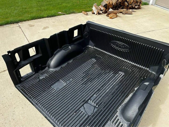 Ford F-150 bed liner for truck bed protection, Ford F-150 spray-in bed liner, Ford F-150 drop-in bed liner, Ford F-150 heavy-duty bed mat, Ford F-150 BedRug-style bed liner, Black Ford F-150 truck bed liner, Ford F-150 5.5-foot bed liner, Ford F-150 6.5-foot bed liner, Ford F-150 8-foot bed liner, Aftermarket Ford F-150 bed liner, Heavy-duty F-150 pickup bed liner, Ford F-150 bed liner with tailgate protection,Ford F-150 bed liner for truck bed protection
