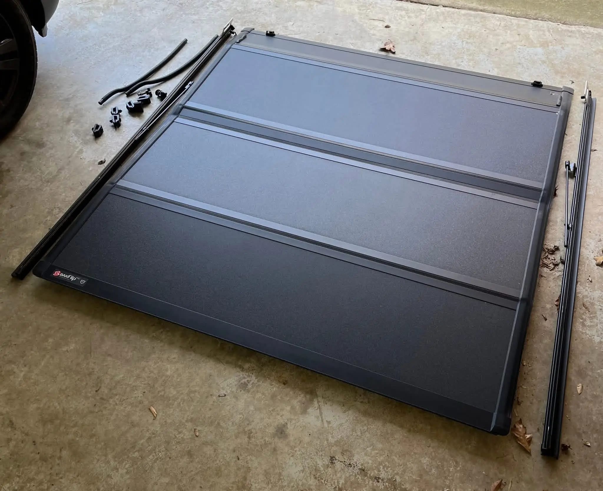 Ford F-150 soft roll-up tonneau cover for truck bed, Ford F-150 soft tri-fold tonneau bed cover, Ford F-150 hard folding tonneau cover for pickup truck, Ford F-150 hard tri-fold truck bed tonneau cover, Ford F-150 hard roll-up tonneau bed cover, Ford F-150 one-piece hard tonneau truck bed cover, Ford F-150 manual retractable tonneau bed cover, Ford F-150 electric retractable tonneau truck bed cover, Ford F-150 tonneau covers and truck bed covers, Ford F-150 pickup truck with tonneau bed cover installed,