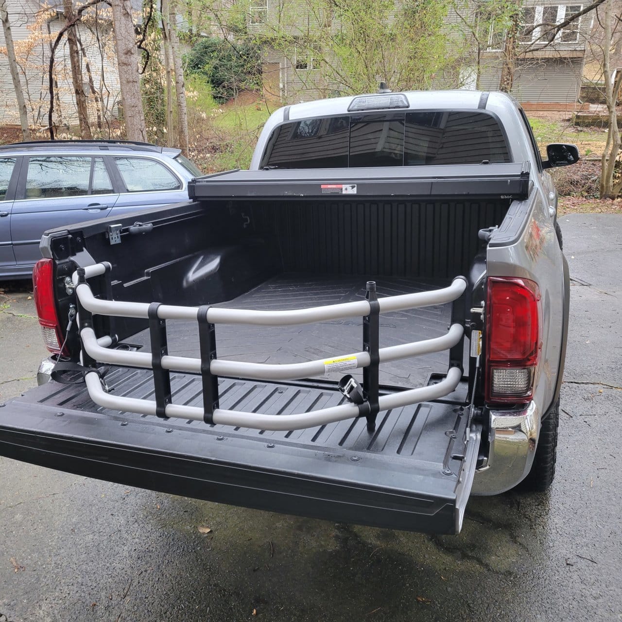 Toyota Tacoma bed extender installed on tailgate, Tacoma truck bed extender for long cargo, Toyota Tacoma adjustable bed extender, Tacoma tailgate bed extender for hauling, Tacoma bed-mounted cargo extender, Toyota Tacoma hitch-mounted bed extender, Tacoma Sport bed extender, Tacoma Max bed extender, Tacoma Moto bed extender for bikes, Toyota Tacoma aluminum bed extender, Tacoma truck bed extender with tailgate down, Tacoma bed extender for ladders and long cargo, Toyota Tacoma cargo bed extender accessory, Tacoma pickup truck bed extender for sale,