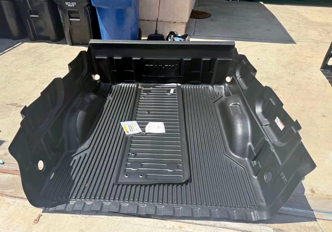 Toyota Tacoma spray-in bed liner installed in pickup truck bed, Toyota Tacoma drop-in bed liner full bed protection, Toyota Tacoma rubber bed mat heavy-duty cargo protection, Toyota Tacoma heavy-duty truck bed liner mat, Toyota Tacoma full bed liner with tailgate protection, Toyota Tacoma carpet bed liner interior, Toyota Tacoma DIY spray-on bed liner kit, Toyota Tacoma bed and tailgate mat set, Toyota Tacoma 5-foot bed liner, Toyota Tacoma 6-foot bed liner, Black Toyota Tacoma bed liner for cargo protection, Toyota Tacoma aftermarket bed liner replacement,