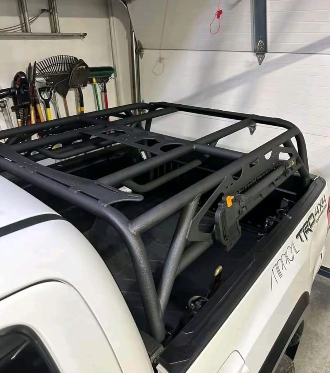 Toyota Tacoma bed rack mounted over pickup truck bed, Toyota Tacoma adjustable bed rack for cargo and outdoor gear, Toyota Tacoma mid-height truck bed rack with crossbars, Toyota Tacoma full-height bed rack for overlanding equipment, Toyota Tacoma heavy-duty steel bed rack with cargo platform, Toyota Tacoma aluminum bed rack for camping and cargo, Toyota Tacoma overland bed rack with rooftop tent setup, Toyota Tacoma MOLLE panel bed rack for off-road gear, Toyota Tacoma chase rack with crossbars and rear cargo support, Toyota Tacoma platform bed rack for camping equipment, Toyota Tacoma truck bed rack with side panels and mounting points, Toyota Tacoma universal bed rack for bikes, kayaks and cargo, Toyota Tacoma premium adjustable truck bed rack system, Toyota Tacoma off-road bed rack with recovery gear, Toyota Tacoma bed rack system for outdoor adventure and camping,
