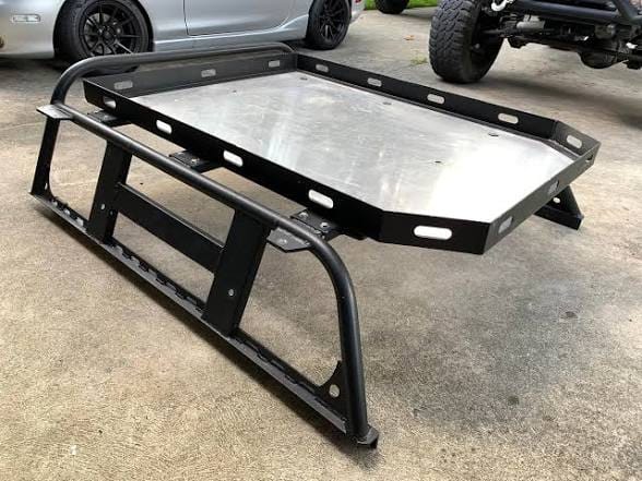 Toyota Tacoma overlanding bed rack for camping and off-road gear Tacoma mid-height overland bed rack with rooftop tent Toyota Tacoma full-height overlanding rack with cargo platform Tacoma heavy-duty overland bed rack with MOLLE side panels Toyota Tacoma modular T-slot overland rack Tacoma adjustable overlanding bed rack for outdoor equipment Toyota Tacoma low-profile overland bed rack Tacoma platform overlanding rack for rooftop tent and cargo Toyota Tacoma off-road bed rack for camping equipment Tacoma overlanding rack with side panels and accessory mounts Toyota Tacoma aluminum overland bed rack Tacoma steel overlanding rack for outdoor adventures