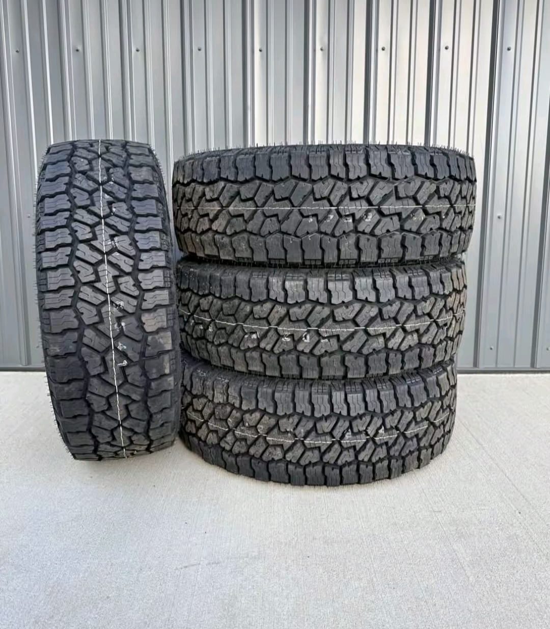 Toyota Tacoma all-terrain tires with aggressive tread for on-road and off-road driving