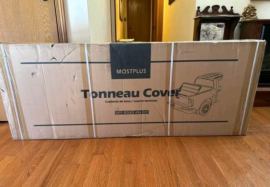 Toyota Tacoma hard folding tonneau cover, Toyota Tacoma hard tri-fold tonneau cover, Tacoma aluminum hard folding bed cover, Tacoma low-profile hard tonneau cover, Toyota Tacoma T-slot hard folding tonneau cover Tacoma premium hard folding truck bed cover, Toyota Tacoma black hard tonneau cover installed, Tacoma hard folding bed cover closed, Toyota Tacoma hard tri-fold bed cover folded,Toyota Tacoma hard folding tonneau cover installed on truck bed, Tacoma hard folding tonneau cover rear view