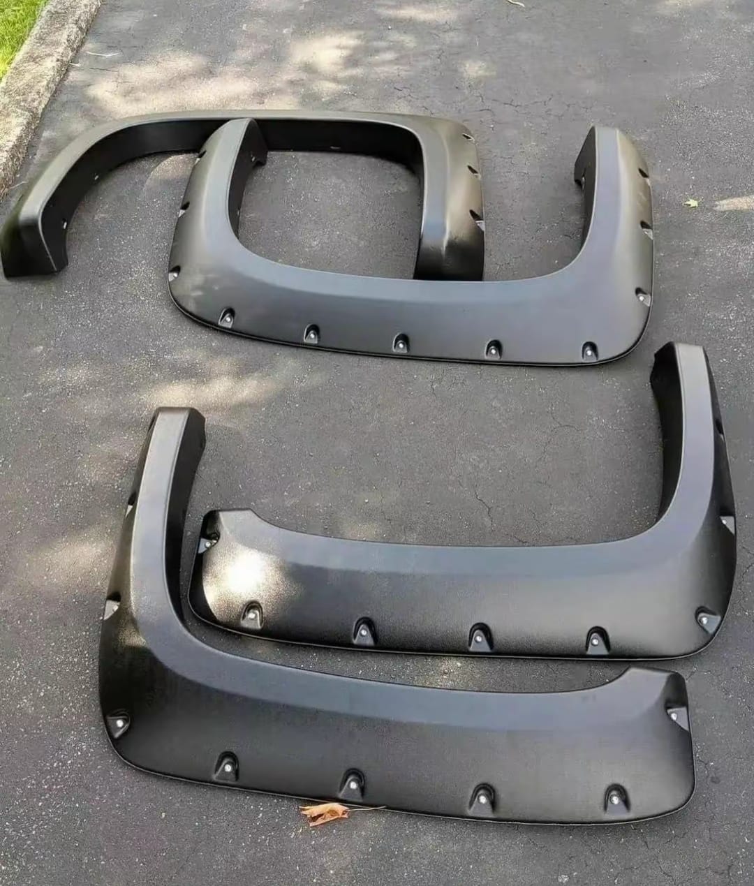 GMC Sierra front and rear fender flares four-piece set, GMC Sierra black front fender flare, GMC Sierra rear fender flare replacement, GMC Sierra OEM-style front and rear fender flare set, GMC Sierra bolt-on look fender flares, GMC Sierra paintable fender flare set, GMC Sierra color-matched front and rear fender flares, GMC Sierra 1500 front and rear wheel arch fender flares, GMC Sierra 2500 HD front and rear fender flare set, GMC Sierra 3500 HD front and rear fender flares,