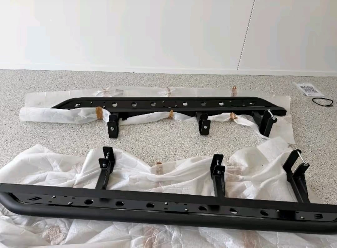 Ford F-150 rock sliders for off-road protection, Ford F-150 heavy-duty steel rock sliders, Ford F-150 bolt-on rock sliders, Ford F-150 frame-mounted rock sliders, Ford F-150 rock sliders with integrated steps, Ford F-150 tube-style off-road rock sliders, Ford F-150 rocker panel protection sliders, Ford F-150 off-road side rock rails, Ford F-150 rock sliders mounted on truck, Ford F-150 premium off-road rock sliders,