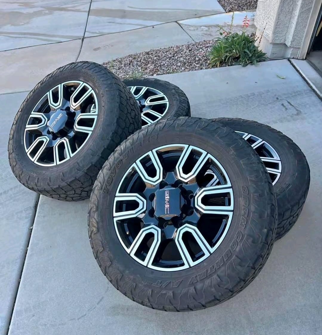 GMC pickup truck tires for Sierra replacement applications, GMC Sierra all terrain pickup truck tire with rugged tread, GMC Sierra mud terrain tire for off road driving, GMC pickup truck highway terrain tire for daily driving, GMC Sierra all season replacement tire, GMC Sierra 1500 all terrain truck tires, GMC Sierra 2500 HD heavy duty pickup truck tires, GMC Sierra 3500 HD tires for towing and work use, GMC Sierra AT4 off road tires with aggressive tread, GMC pickup truck tire close up showing deep tread pattern, GMC Sierra rugged terrain truck tire for mixed road use, GMC heavy duty LT tire for GMC pickup trucks, GMC Sierra replacement tires in multiple sizes, GMC pickup truck off road tire with reinforced tread design, GMC Sierra truck tires for highway gravel and dirt roads,