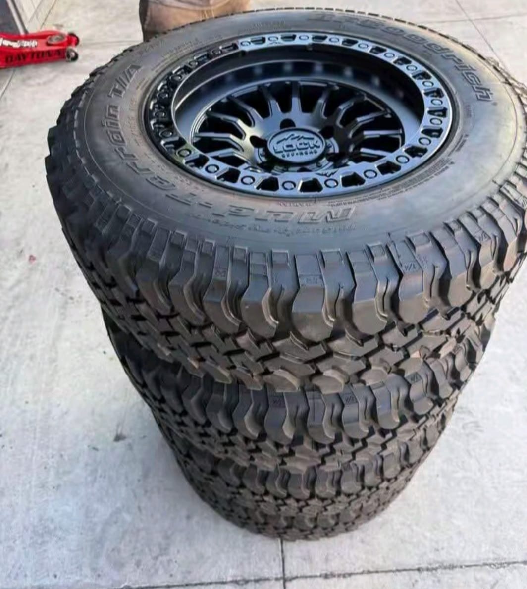 GMC pickup truck tires for Sierra replacement applications, GMC Sierra all terrain pickup truck tire with rugged tread, GMC Sierra mud terrain tire for off road driving, GMC pickup truck highway terrain tire for daily driving, GMC Sierra all season replacement tire, GMC Sierra 1500 all terrain truck tires, GMC Sierra 2500 HD heavy duty pickup truck tires, GMC Sierra 3500 HD tires for towing and work use, GMC Sierra AT4 off road tires with aggressive tread, GMC pickup truck tire close up showing deep tread pattern, GMC Sierra rugged terrain truck tire for mixed road use, GMC heavy duty LT tire for GMC pickup trucks, GMC Sierra replacement tires in multiple sizes, GMC pickup truck off road tire with reinforced tread design, GMC Sierra truck tires for highway gravel and dirt roads,