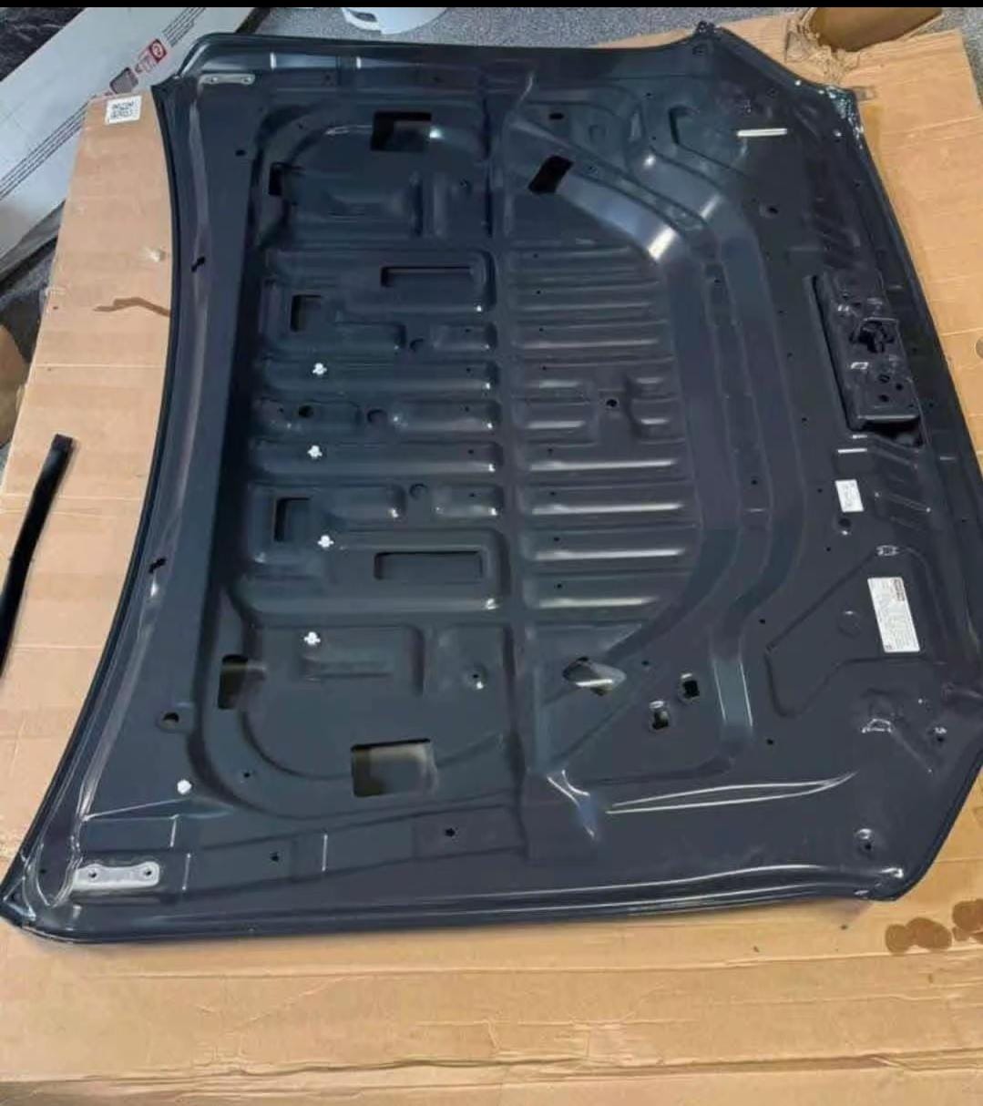 Toyota Tacoma replacement hood for pickup truck, Toyota Tacoma OEM style hood replacement, Tacoma pickup truck hood panel, Toyota Tacoma hood with scoop, Tacoma hood without scoop replacement, Toyota Tacoma aftermarket replacement hood, Tacoma cowl hood for customized pickup truck, Toyota Tacoma performance style hood, Tacoma ram air hood replacement, Toyota Tacoma carbon fiber hood, Tacoma TRD style hood with scoop, Toyota Tacoma front hood replacement body panel, Tacoma truck hood for exterior restoration, Toyota Tacoma replacement hood close up, Tacoma hood panel for truck repair and upgrade,