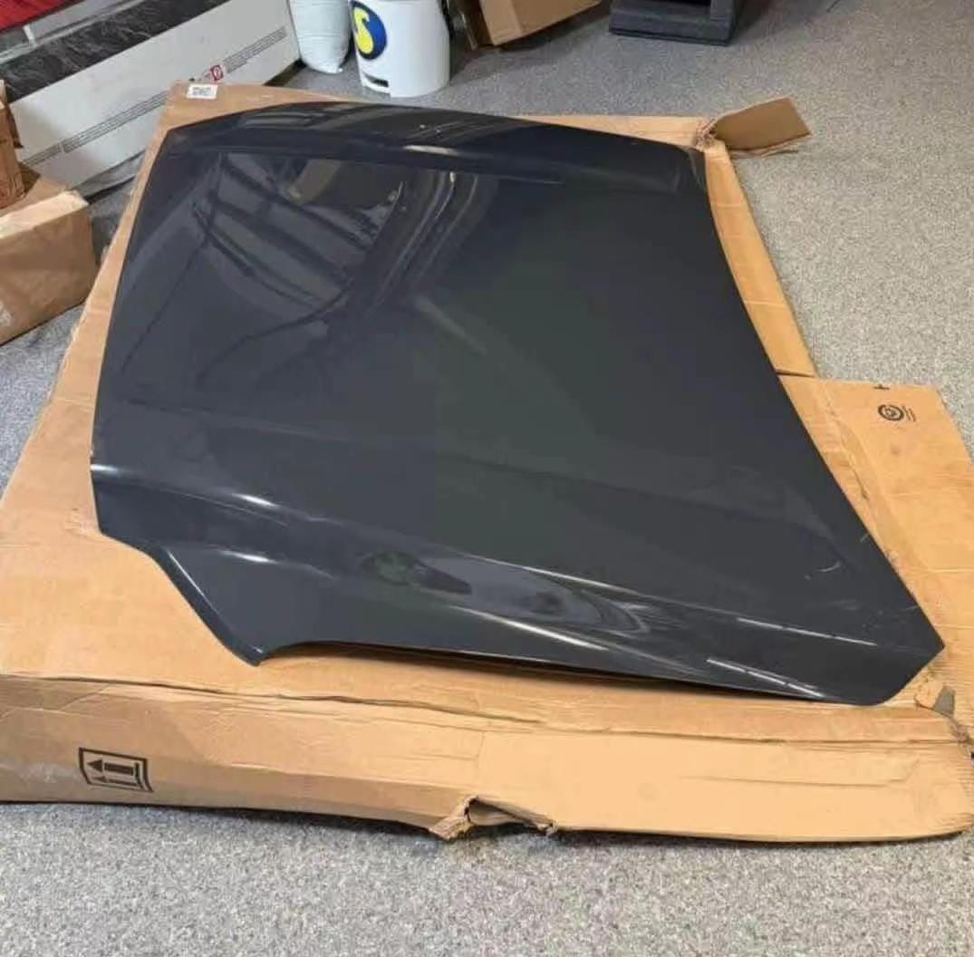 Toyota Tacoma replacement hood for pickup truck, Toyota Tacoma OEM style hood replacement, Tacoma pickup truck hood panel, Toyota Tacoma hood with scoop, Tacoma hood without scoop replacement, Toyota Tacoma aftermarket replacement hood, Tacoma cowl hood for customized pickup truck, Toyota Tacoma performance style hood, Tacoma ram air hood replacement, Toyota Tacoma carbon fiber hood, Tacoma TRD style hood with scoop, Toyota Tacoma front hood replacement body panel, Tacoma truck hood for exterior restoration, Toyota Tacoma replacement hood close up, Tacoma hood panel for truck repair and upgrade,