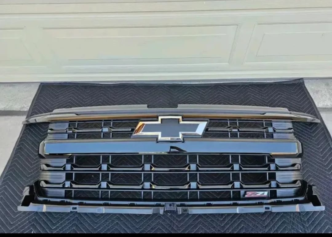 Chevrolet Silverado 1500 replacement front grille, Chevrolet Silverado 1500 black grille, Chevrolet Silverado 1500 chrome grille, Chevrolet Silverado 1500 mesh grille, Chevrolet Silverado 1500 factory-style grille, Chevrolet Silverado 1500 ZR2 grille, Chevrolet Silverado 2500HD replacement grille, Chevrolet Silverado 2500HD black front grille, Chevrolet Silverado 2500HD chrome grille, Chevrolet Silverado 2500HD mesh grille, Chevrolet Silverado 2500HD factory-style grille, Chevrolet Silverado 3500HD replacement grille, Chevrolet Silverado 3500HD black grille, Chevrolet Silverado 3500HD chrome front grille, Chevrolet Silverado 3500HD mesh grille, Chevrolet Silverado 3500HD factory-style grille, Silverado 2500HD 3500HD Chevrolet script grille, Silverado grille with Chevrolet Bowtie emblem, Silverado grille with front camera opening, Chevrolet Silverado aftermarket replacement grille,
