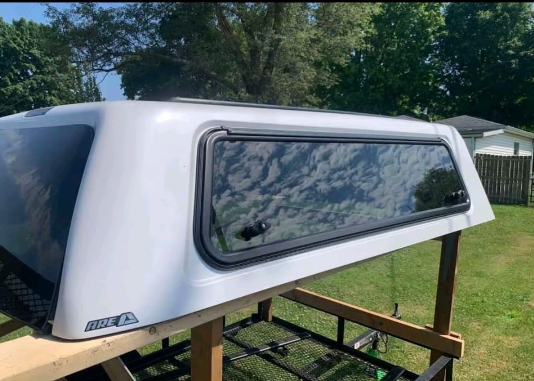 Chevrolet Silverado 1500 camper shell topper, Chevrolet Silverado 1500 fiberglass camper shell, Silverado 1500 aluminum truck topper, Silverado 1500 soft camper top, Silverado 1500 cab-high truck cap, Silverado 1500 high-rise camper shell, Chevrolet Silverado 2500HD camper shell, Silverado 2500HD aluminum truck topper, Silverado 2500HD fiberglass bed cap, Silverado 2500HD commercial truck topper, Chevrolet Silverado 3500HD camper shell, Silverado 3500HD heavy-duty truck topper, Silverado 3500HD aluminum camper cap, Silverado 3500HD fiberglass bed topper, Silverado truck camper shell with side windows, Silverado truck topper with rear access door, Silverado camper shell for covered cargo storage, Chevrolet Silverado truck cap for work equipment, Silverado pickup camper shell for outdoor gear, Chevrolet Silverado 1500 2500HD 3500HD truck toppers,