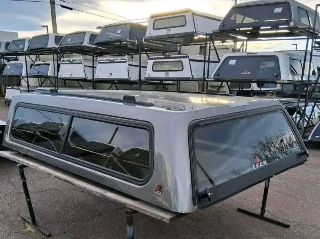 Chevrolet Silverado 1500 camper shell topper, Chevrolet Silverado 1500 fiberglass camper shell, Silverado 1500 aluminum truck topper, Silverado 1500 soft camper top, Silverado 1500 cab-high truck cap, Silverado 1500 high-rise camper shell, Chevrolet Silverado 2500HD camper shell, Silverado 2500HD aluminum truck topper, Silverado 2500HD fiberglass bed cap, Silverado 2500HD commercial truck topper, Chevrolet Silverado 3500HD camper shell, Silverado 3500HD heavy-duty truck topper, Silverado 3500HD aluminum camper cap, Silverado 3500HD fiberglass bed topper, Silverado truck camper shell with side windows, Silverado truck topper with rear access door, Silverado camper shell for covered cargo storage, Chevrolet Silverado truck cap for work equipment, Silverado pickup camper shell for outdoor gear, Chevrolet Silverado 1500 2500HD 3500HD truck toppers,